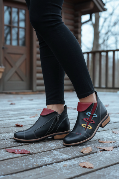 Person wearing Django & Juliette boots showing zipper and colorful laces